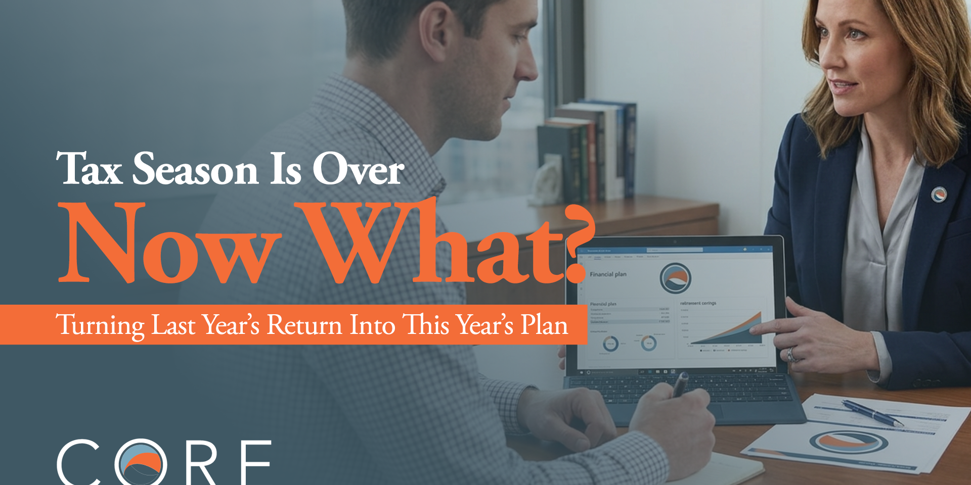 Man and woman financial advisors discussing a "Tax Season Is Over—Now What?" presentation on a screen.